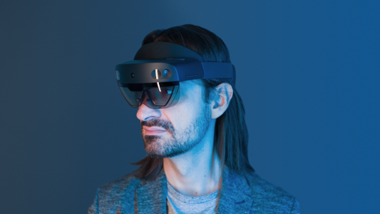 alex kipman wearing a hololens 2 device